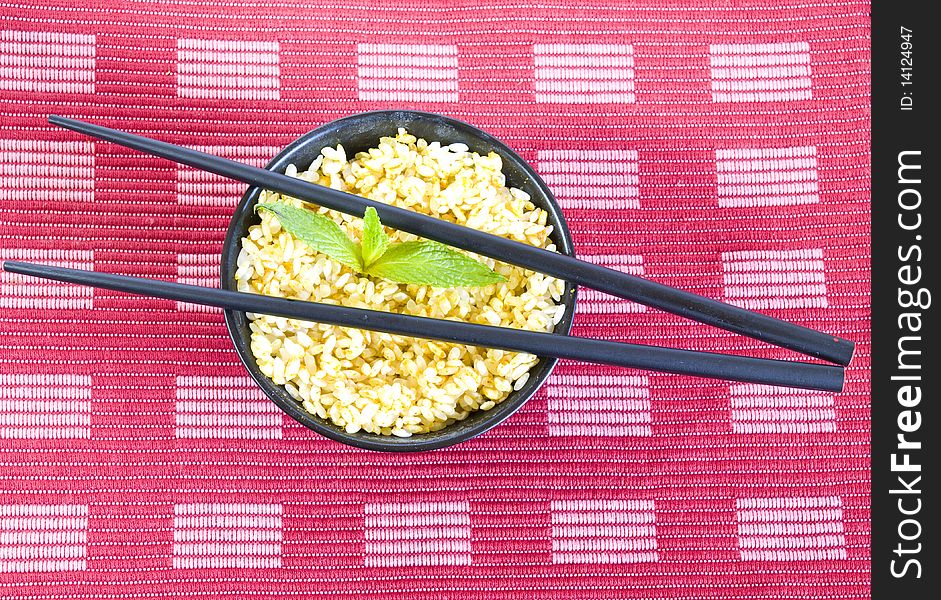 Curry rice bowl with chopsticks