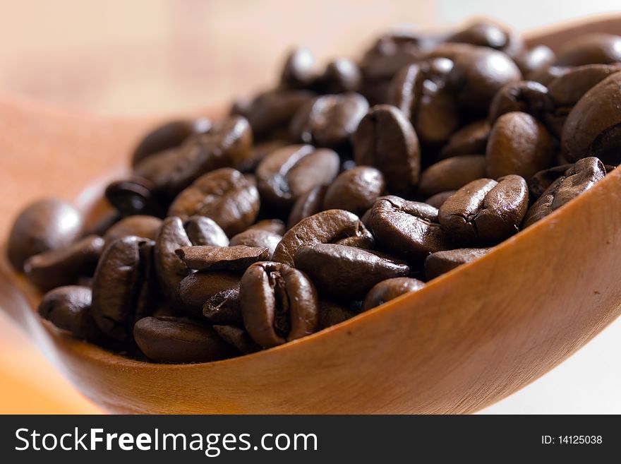 Fresh Roasted,coffee Beans In The Spoon,close Up