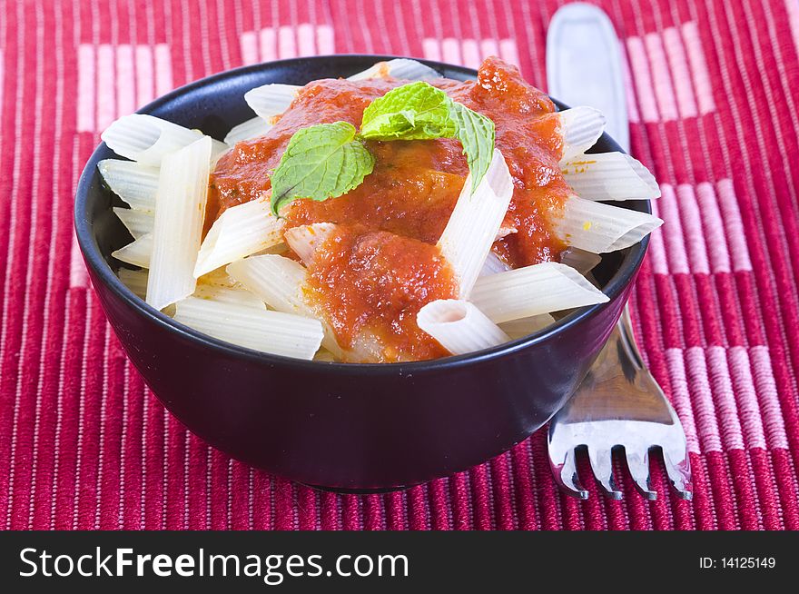 Lunchtime-rice pasta with tomato sauce. Lunchtime-rice pasta with tomato sauce