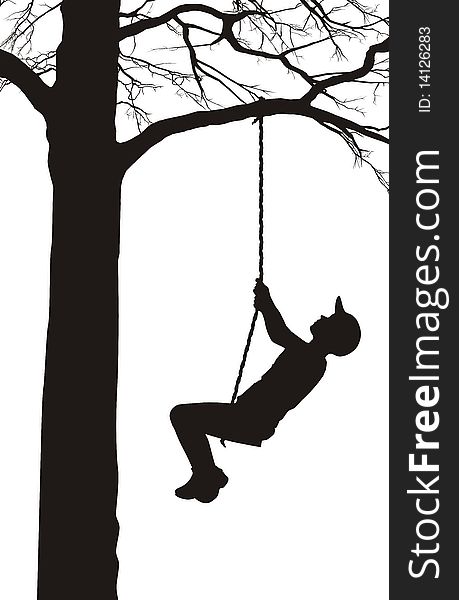 A boy swings on a tree