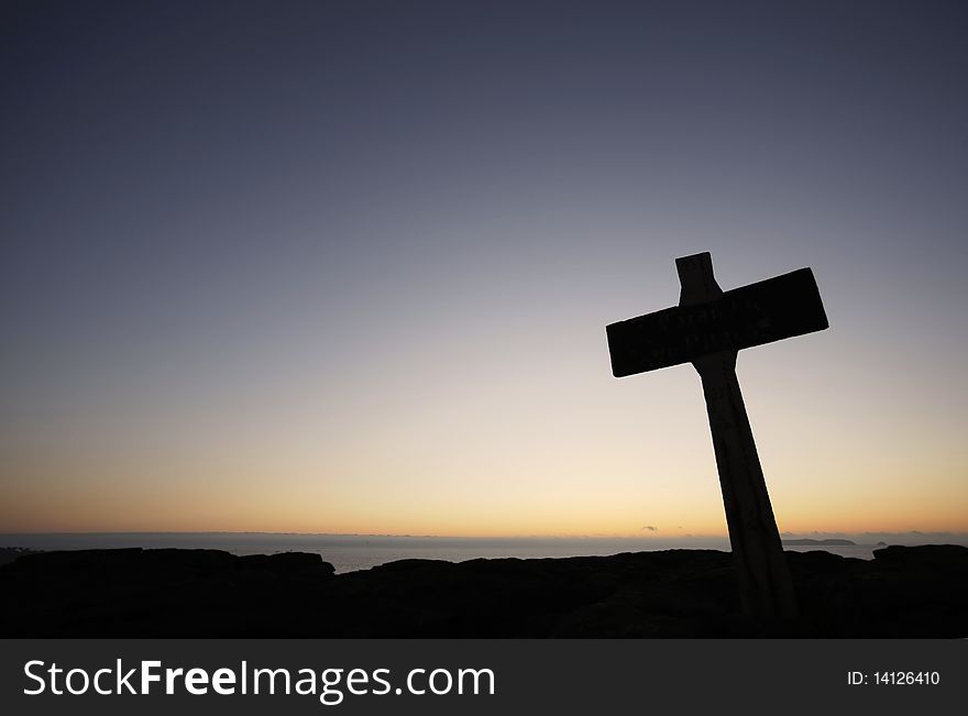 Sign silhouette on top of the mountain