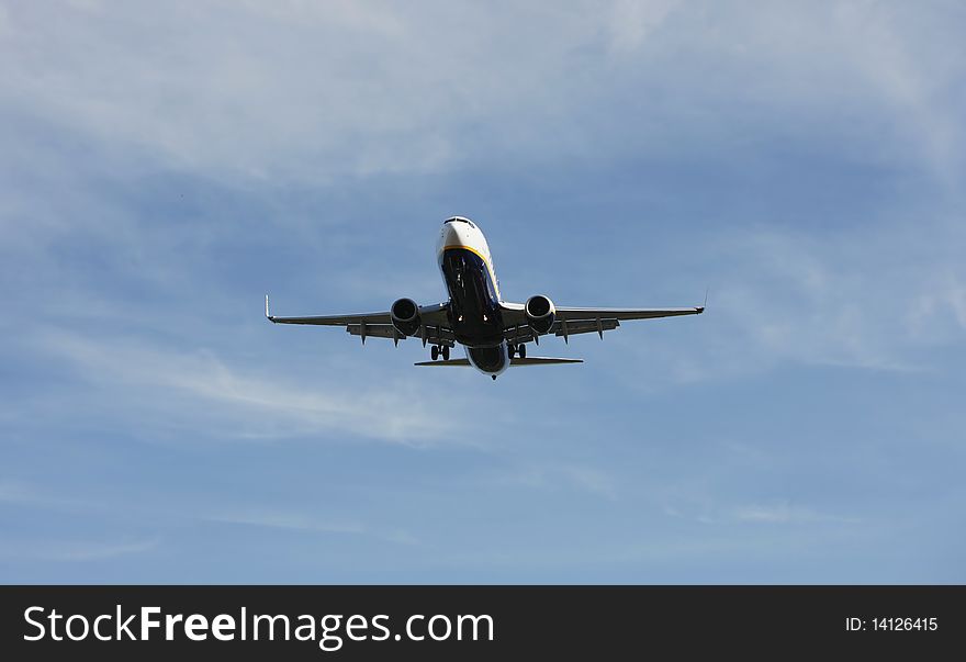 Airliner Makes its Landing Approach with a blue sky