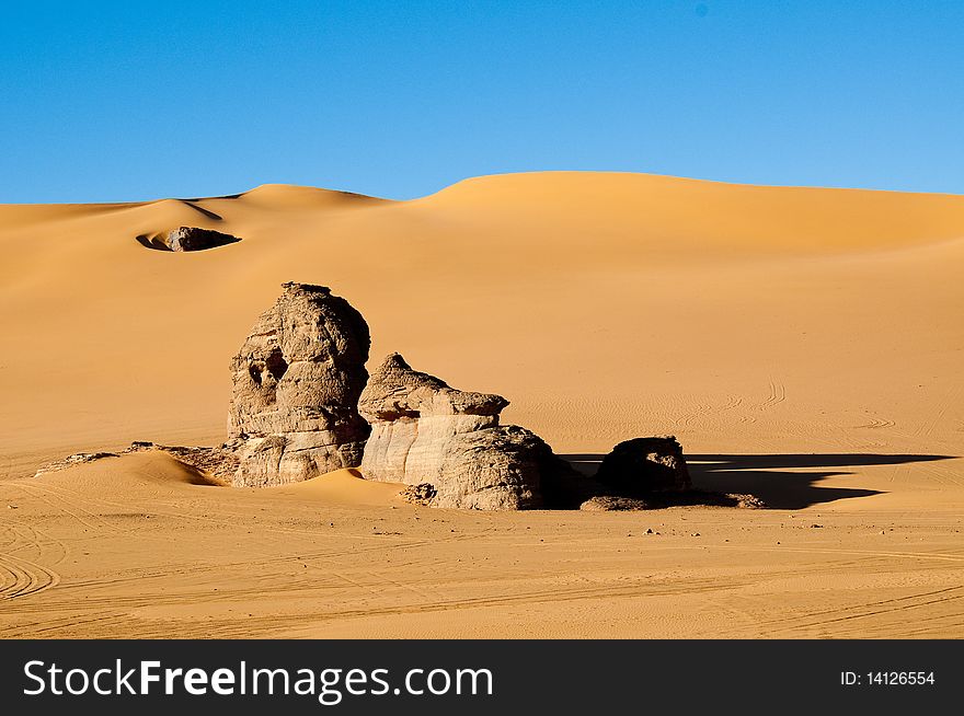 Rock light and shadows in Sahara desert. Rock light and shadows in Sahara desert