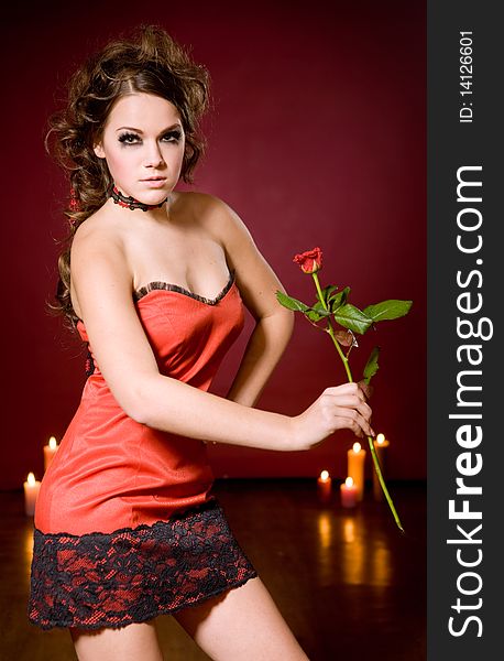 girl with rose on red background. girl with rose on red background