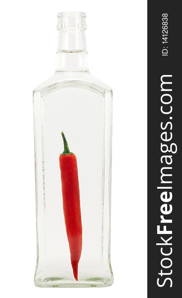 Chili pepper inside the bottle on a white background