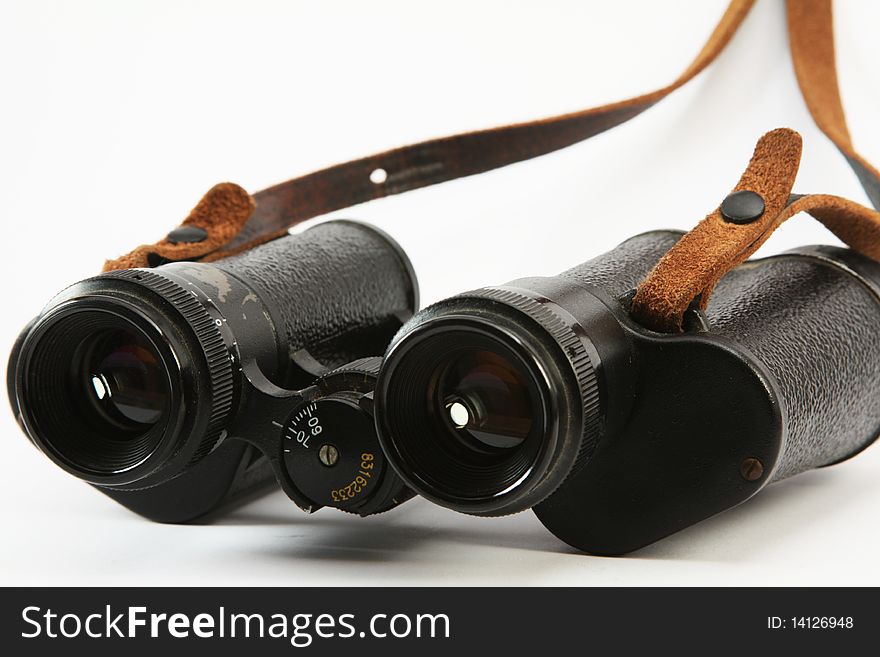 Old russian binoculars isolated on white background. Old russian binoculars isolated on white background