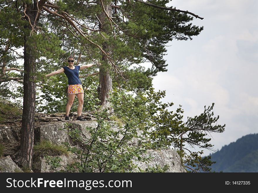 Woman on Tomasovsky Vyhlad - a big rock in Slovak Paradise