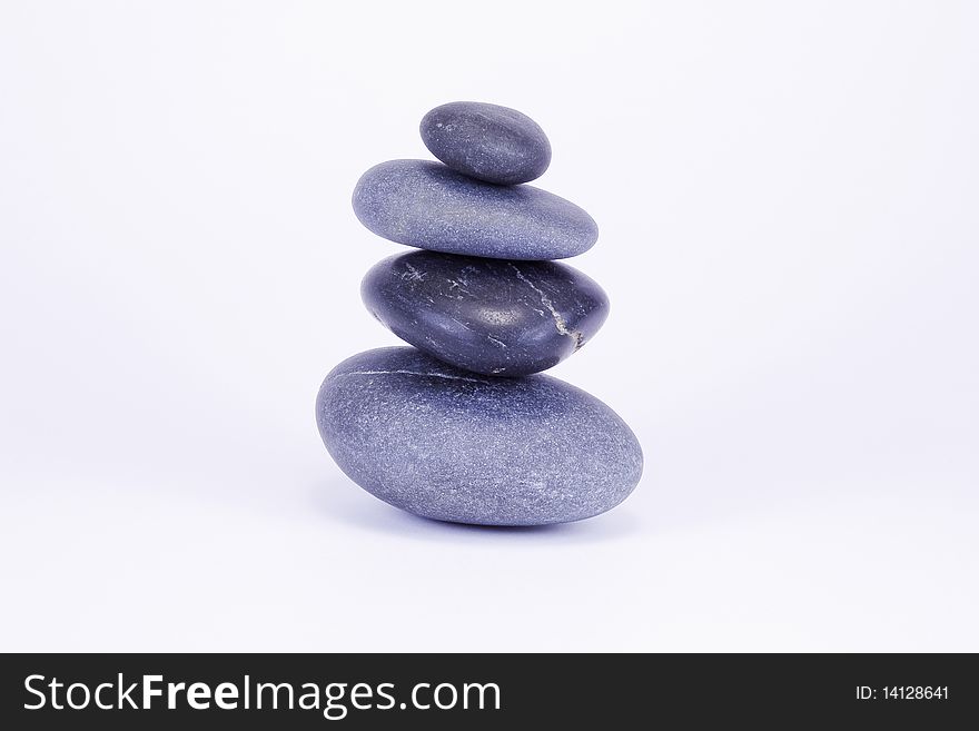A tower made with grey stones. A tower made with grey stones