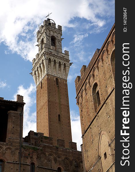 The Torre del Mangia Tower in Siena's Piazza del Campo. The Torre del Mangia Tower in Siena's Piazza del Campo