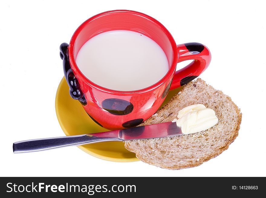 A cup of milk and some bread for morning breakfast
