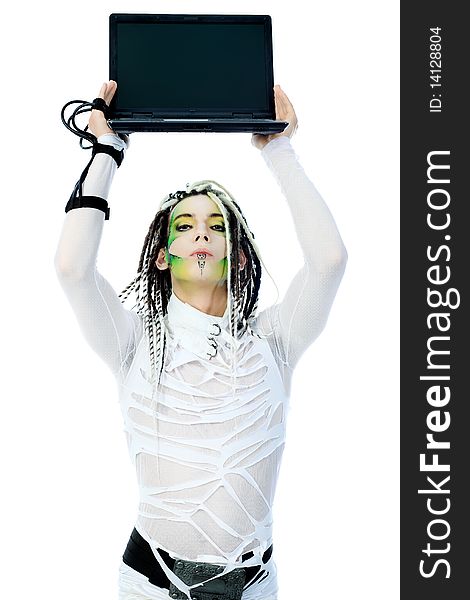 Shot of a futuristic young man with wires holding a laptop. Isolated over white background. Shot of a futuristic young man with wires holding a laptop. Isolated over white background.