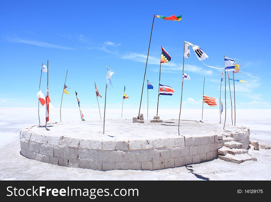 Flags of Different Nations on White Plain. Taken on the Salar de Uyuni (or Uyuni Salt Flats) in Bolivia.