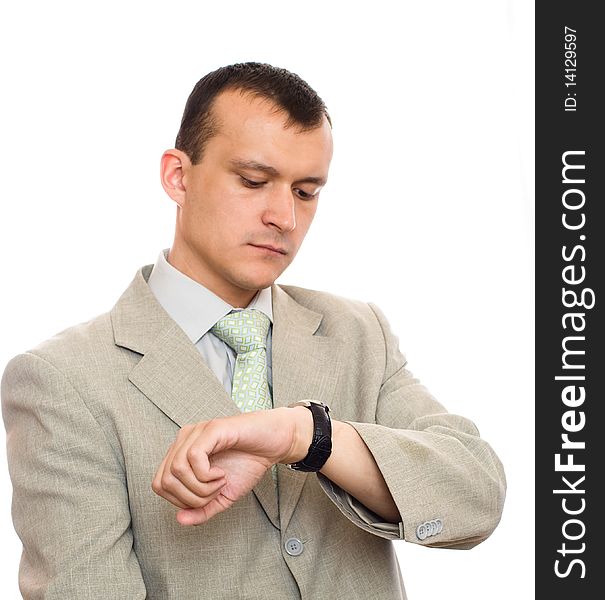 Man Looks At His Watch