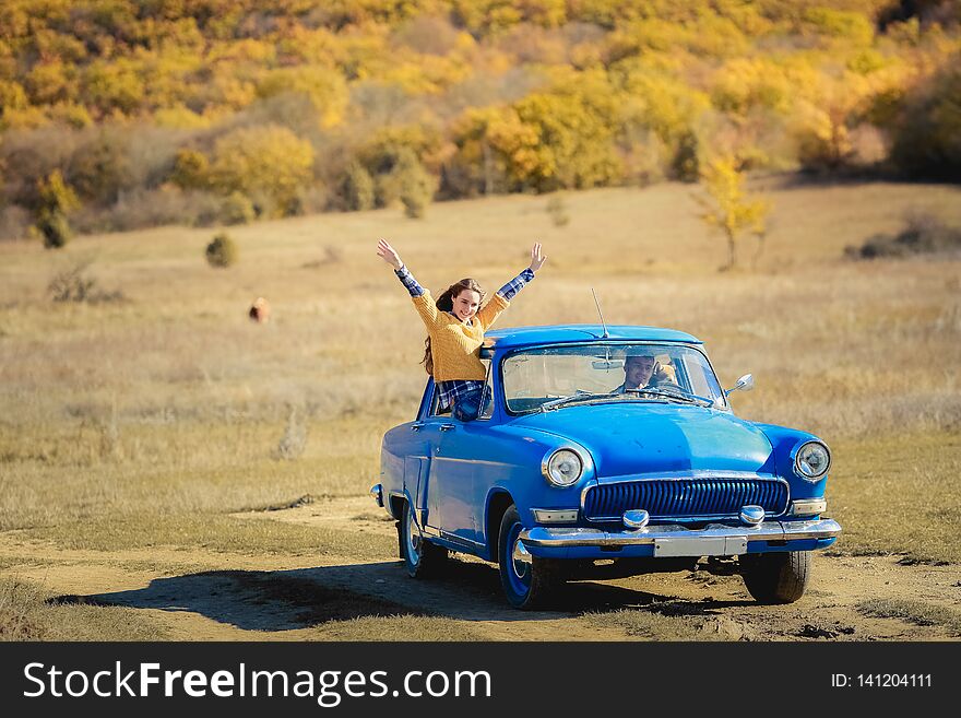 Summer car travel freedom woman in Yosemite National Park with arms raised up cheerful and happy. Summer road trip