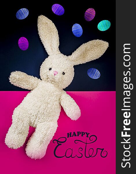 Happy Easter - Card. Toy Hare On A Pink Background