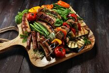 Assorted Delicious Grilled Meat With Vegetable On A Barbecue. Grilled Pork Shish Or Kebab On Skewers With Vegetables . Food Stock Image Assorted Delicious Grilled Meat With Vegetable On A Barbecue. Grilled Pork Shish Or Kebab On Skewers With Vegetables . Food Stock Image