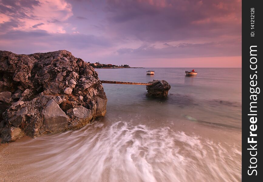 Beautiful sandy beach with rocks