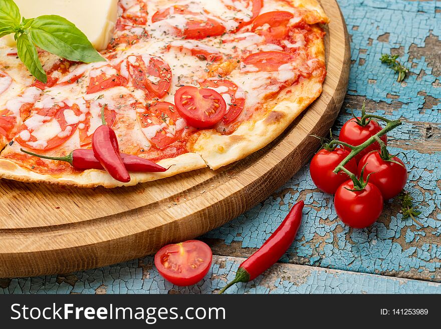 Delicious homemade Italian pizza. Fast and nourishing meal. Delicious homemade Italian pizza. Fast and nourishing meal.