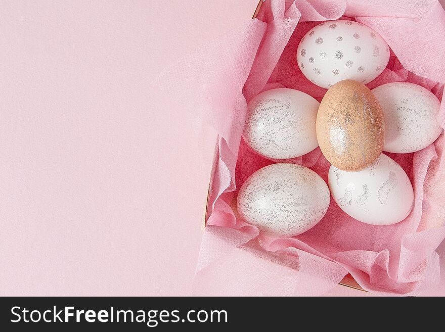 White Easter Eggs In A Nest On Pink Background. Design Pastel Tone In Minimal Flat Lay