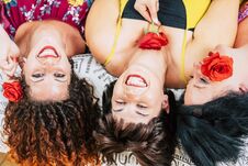 Free Playful Group Of Young Females Friends At Home Together Laughing And Smiling. Lay Down On Bed And Taken From Aerial View. Make Up Stock Image - 141287451
