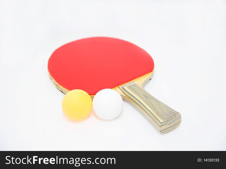 The table tennis bat and ball