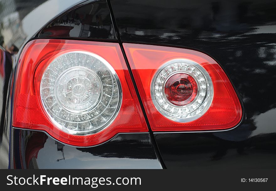 The glass taillight of a modern luxury car.