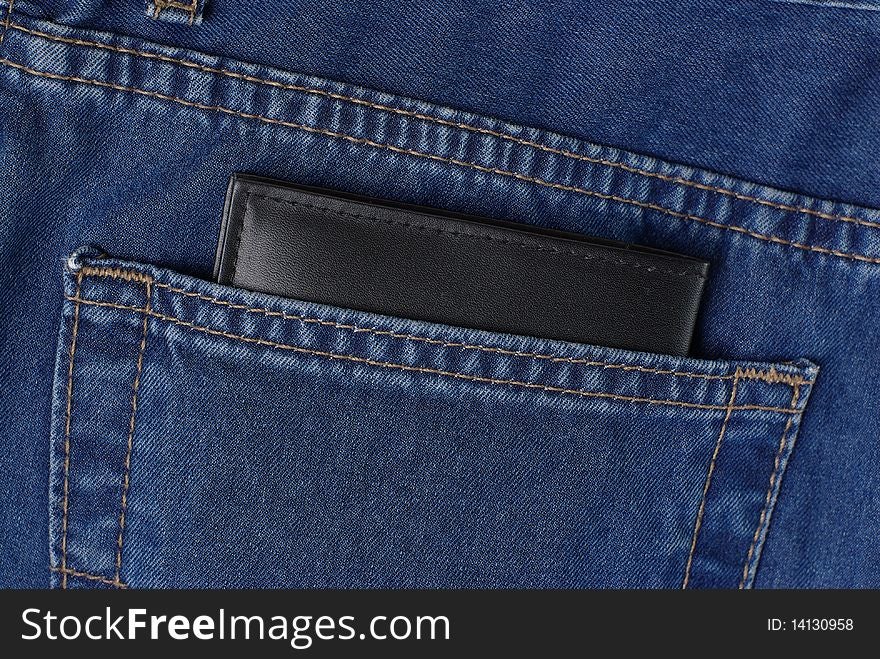 Wallet in blue jeans pocket. Wallet in blue jeans pocket