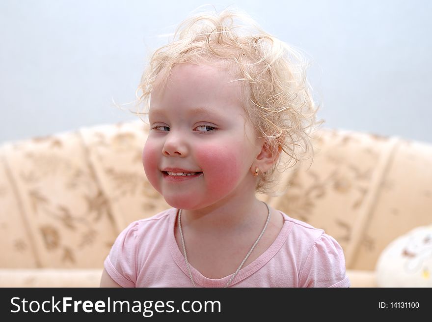 Pretty curly blond hair girl make faces (grimace). Pretty curly blond hair girl make faces (grimace).