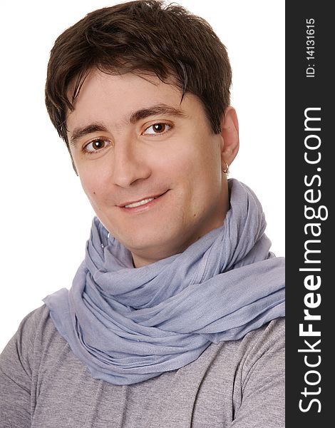 Portrait of young attractive smiling man in blue scarf on white background. Portrait of young attractive smiling man in blue scarf on white background