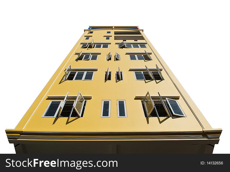 Yellow wall of a high building isolated on white. Yellow wall of a high building isolated on white