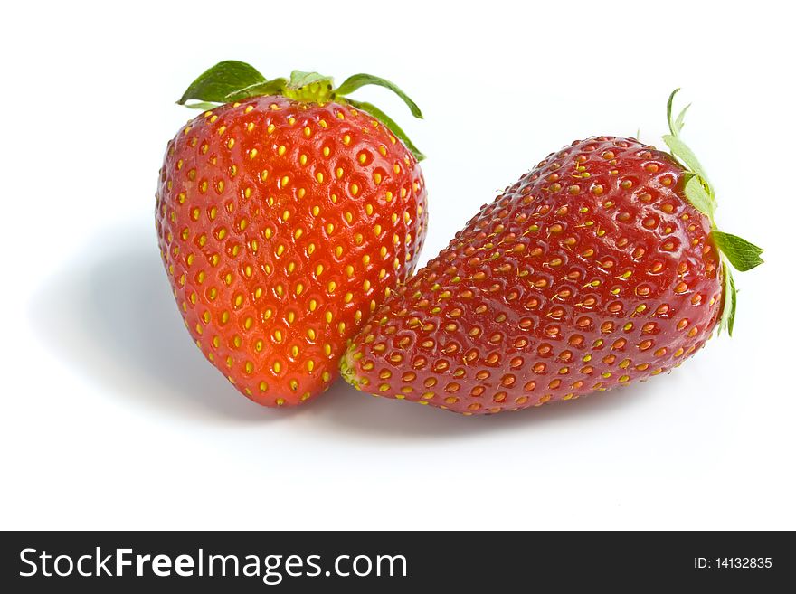 Two ripe and appetizing strawberries.