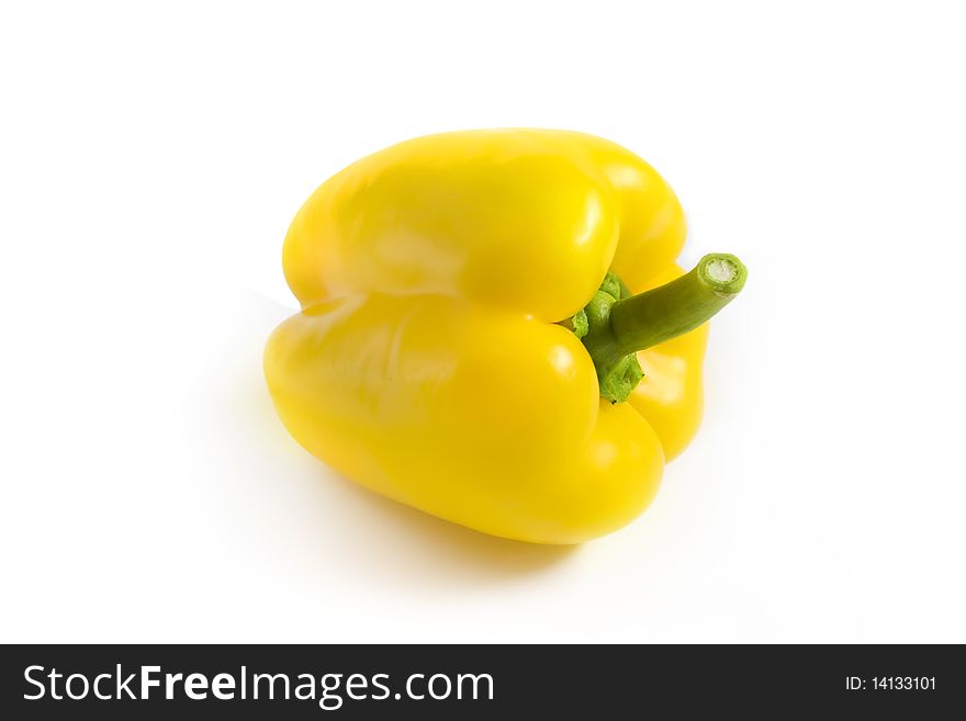 Yellow pepper on a white background. A photo close up.