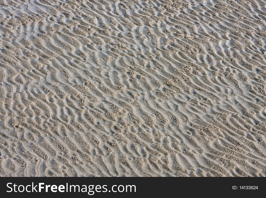 A line of sand on a beach