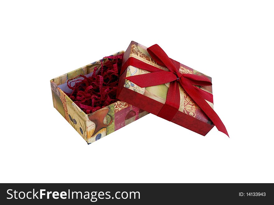 Open gift box with filler and red ribbon