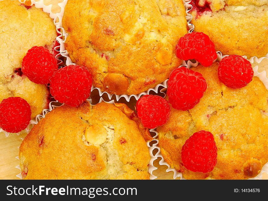 Background of fresh raspberry muffins. Background of fresh raspberry muffins