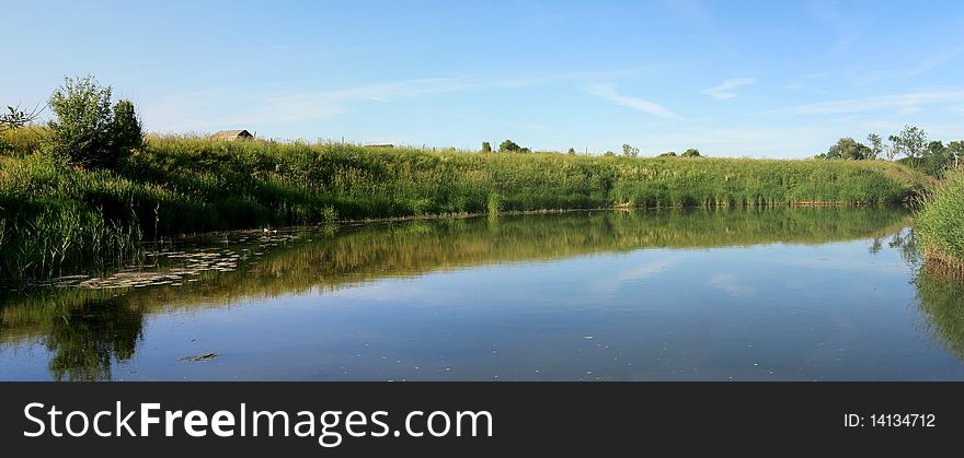 Summer Panoramic Landscape - River, Sky, Coast, Grass. Summer Panoramic Landscape - River, Sky, Coast, Grass