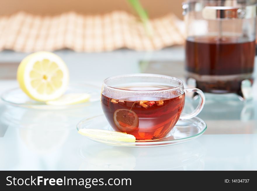 A glass bowl with hot tea