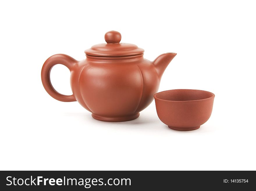 Chinese teapot and cup on a white background