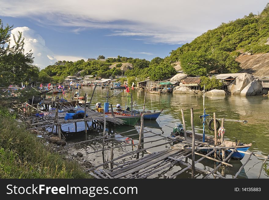 Fishermen boat  and  the small pier where fish are daily landed and auctioned , Huahin Thailand