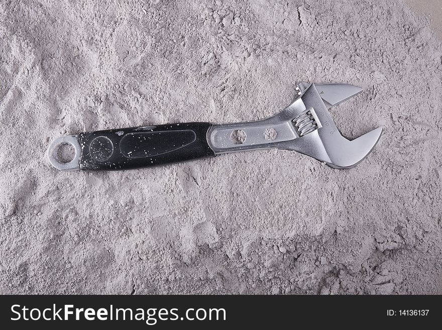 Wrench adjustable on a gray background