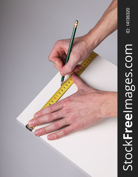 Hands with measurement tool isolated