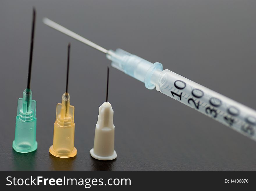 Medical syringe with a needle at the tip