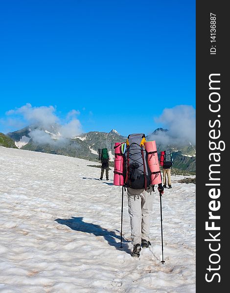 Hiker boy in Caucasus mountains