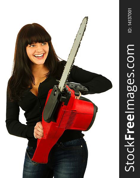 Young brunette woman with the handsaw isolated on white