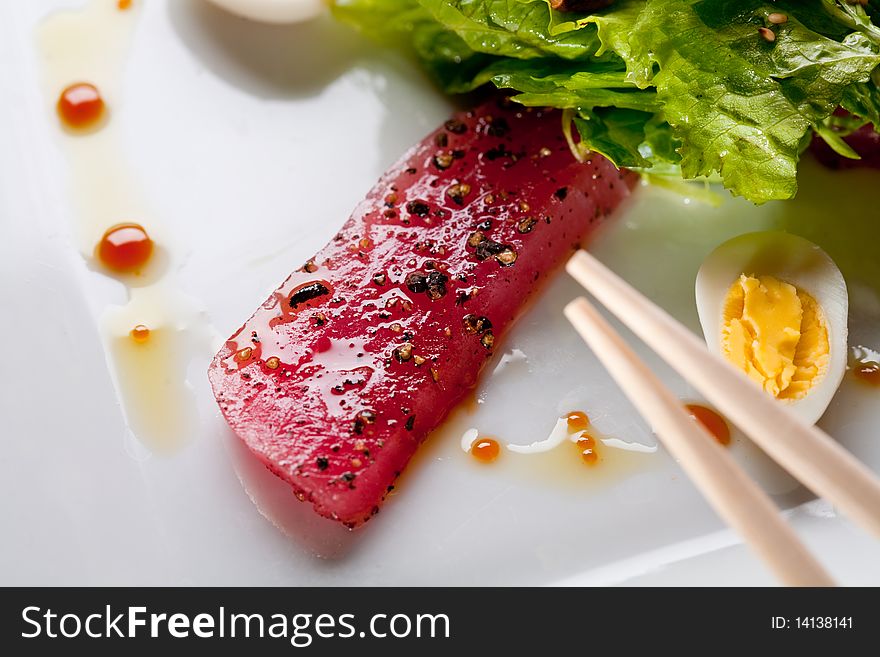 Raw fish tuna with salad
