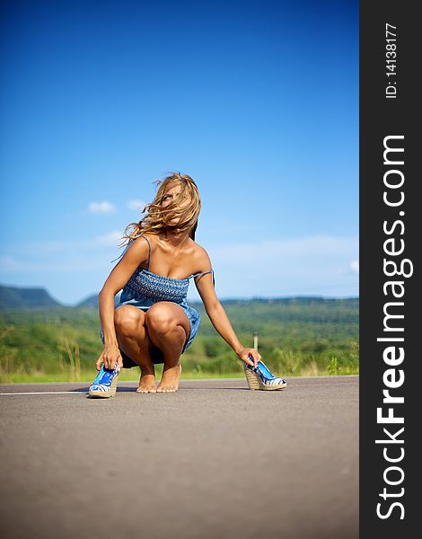 Blond Woman On Summer Day