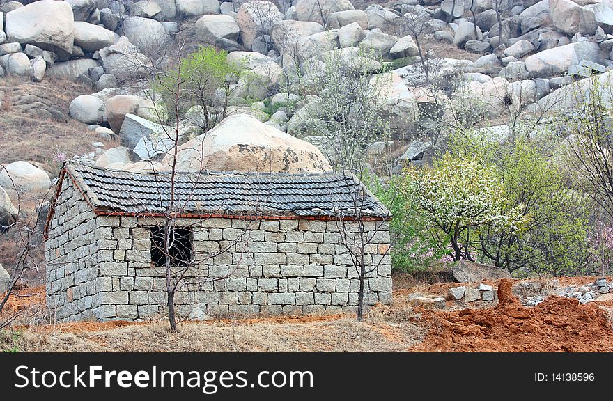 The stone house located in the foothills.