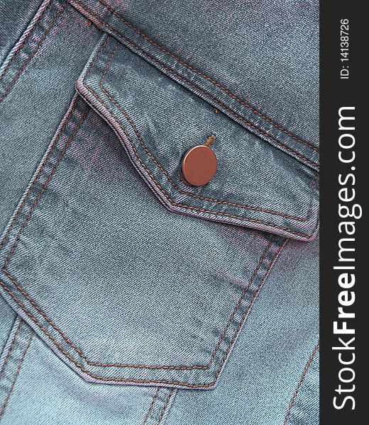 Close up of gray denim jeans pocket