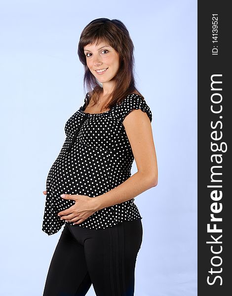 Pregnant female on blue background