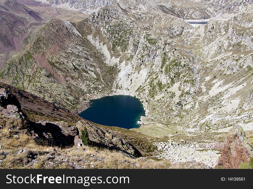 Aerial view on lake in Aiguestortes National Park in Spain. Aerial view on lake in Aiguestortes National Park in Spain.